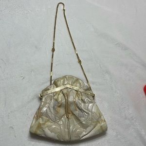 PATCHWORK CONVERTIBLE CLUTCH - Carlo Fiori